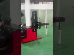 Electric stacker with boom for coils and film rolls